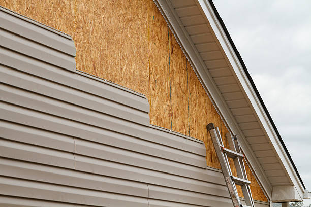 Professional Vinyl Siding technician working in Adena, OH